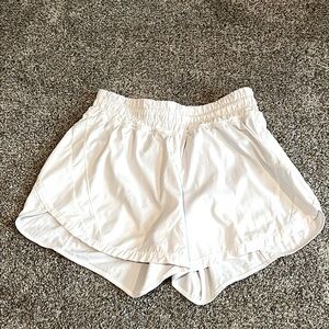 Lululemon white women’s athletic shorts.  Size 8